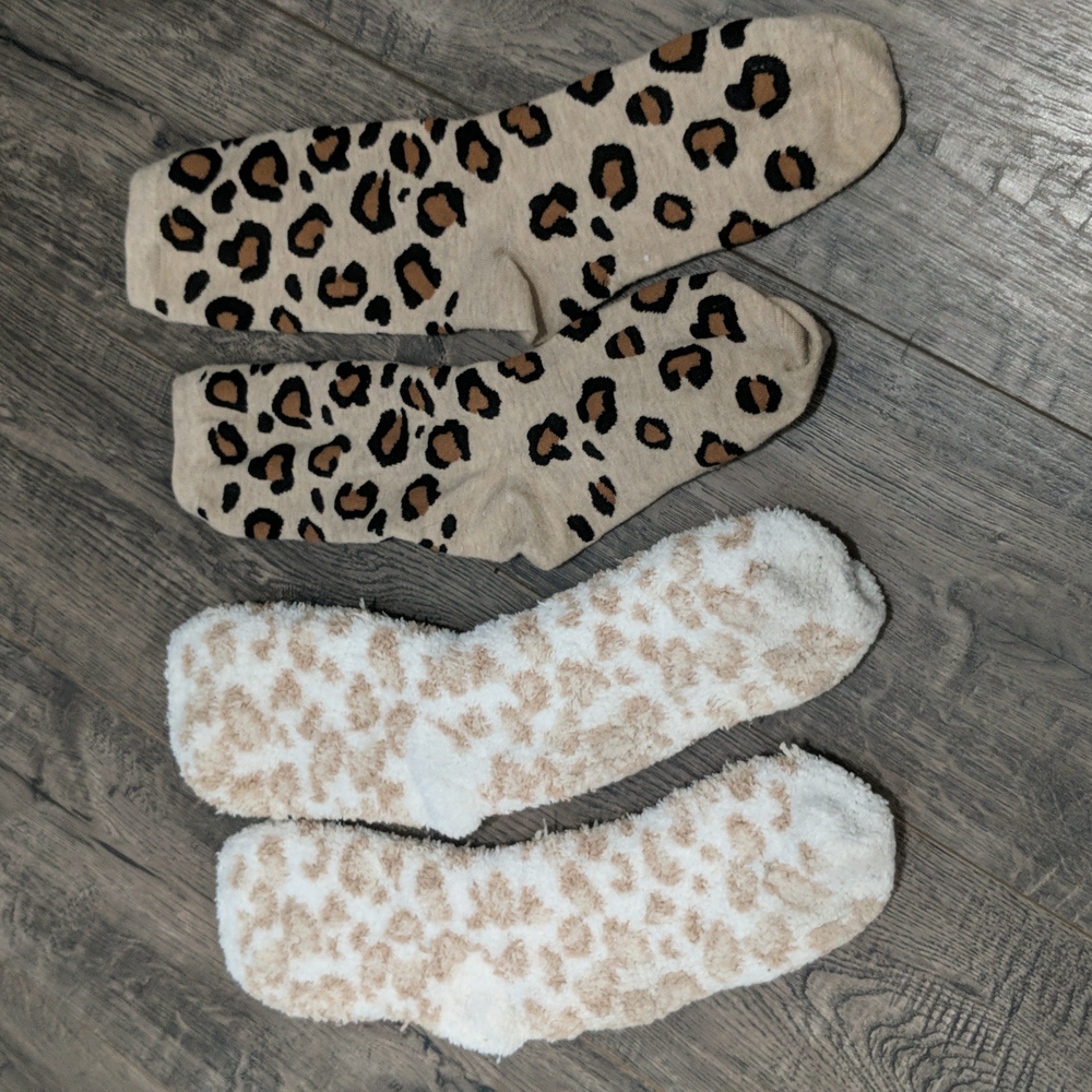 two pairs of cheetah print socks